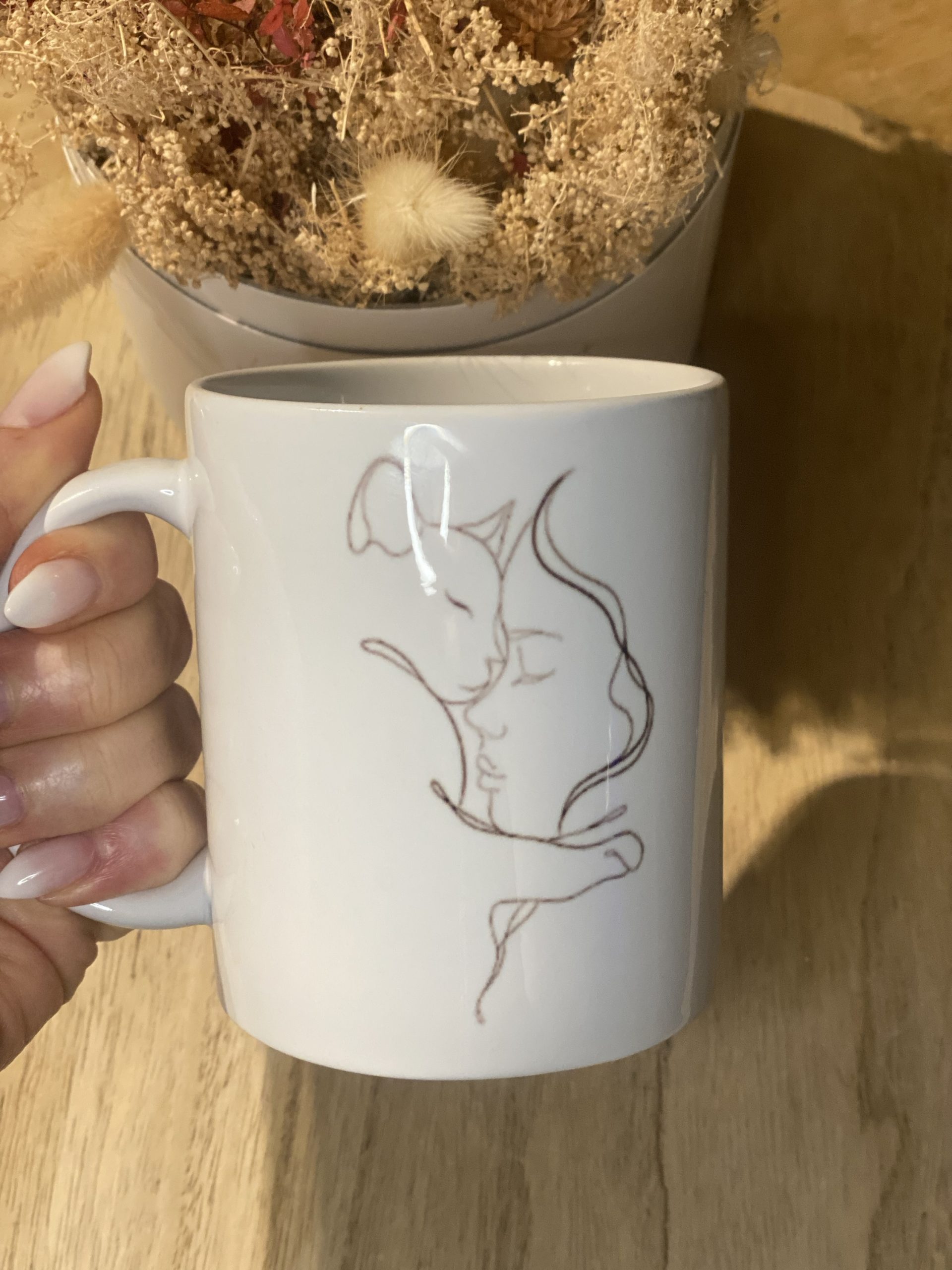 Tasse “Dans ses bras, un monde de douceur” – Image 2